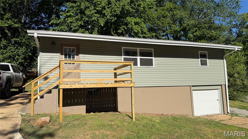 Check out this super nice 4 bed, 2 bath remodeled home in Doniphan! This home has had all new cabinets, paint, flooring, appliances, and more!! This home features a basement for separate living quarters with its own bathroom, kitchenette, and garage entrance! You'll be hard pressed to find a nicer home for the money!! Qualifies for all loan types! Call today!