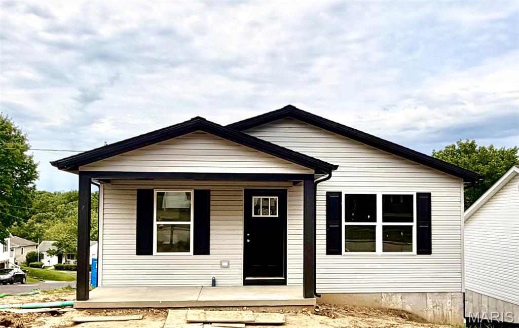 Experience refined living at 223 Fair ST, WASHINGTON MO 63090, NEW CONSTRUCTION single-family residence presented in great condition. This attractive property offers an exceptional opportunity for discerning homeowners seeking a residence that combines comfort with a desirable location near downtown parks and pool. The residence features three well-appointed bedrooms, providing ample private accommodations. Complementing these are two full bathrooms, to offer both functionality and aesthetic appeal. An inviting porch extends the living space outdoors, offering a versatile area for relaxation or entertaining. We invite you to schedule a private viewing to fully appreciate the distinctive qualities of this remarkable property.