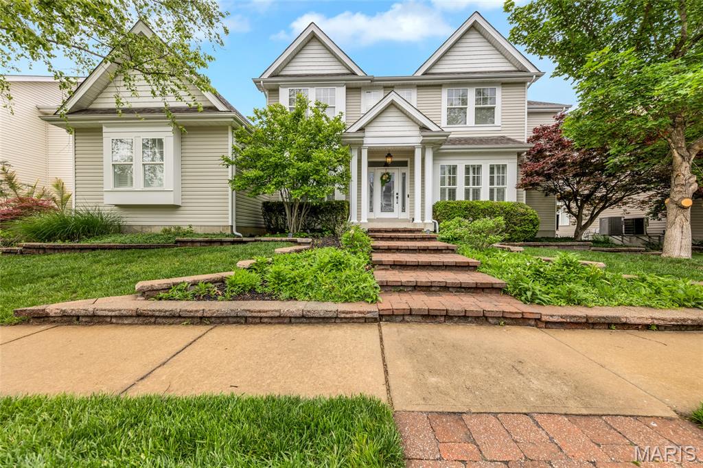 OPEN SAT & SUN, 12:00 - 2:00!!!   Welcome to this stunning 1.5-story home in the coveted Madison Park subdivision. Gorgeous hardwood floors and plantation shutters flow throughout most of the main level, creating a warm and sophisticated atmosphere from the moment you enter. The completely remodeled chef’s kitchen is truly a showstopper, featuring exquisite high-end cabinetry, luxurious countertops, and premium panel-covered appliances, including Sub-Zero, Dacor, and Scotsman. An oversized center island offers additional seating, a beverage refrigerator, and built-in icemaker — perfect for entertaining. The adjoining breakfast room opens to a cozy hearth room, creating the ideal space for gathering with family and friends. Main floor laundry adds everyday convenience with convenient built-ins and sink. The spacious great room impresses with soaring ceilings, a fireplace, and an upper-level balcony overlook that adds dramatic architectural charm. The main floor primary suite is a private retreat with a beautifully remodeled spa-inspired bath, showcasing upscale finishes, heated marble tile floors, a jetted tub, and an incredible walk-in shower with multiple shower heads. Upstairs, you’ll find new carpet throughout the stairwell and second level, where you'll find the secondary bedrooms and two additional full baths. Step outside to your own backyard oasis featuring a fabulous heated, saltwater, inground pool, expansive brick-paver patio and pool deck, and an inground sprinkler system for easy lawn maintenance and an oversized, 3-car garage! This exceptional Madison Park home combines luxury, comfort, and outdoor living at its finest.