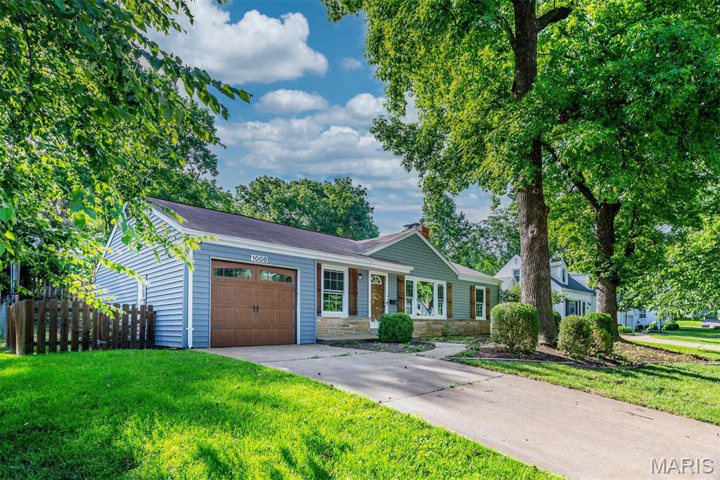 Welcome home to this beautifully updated, move-in-ready ranch house featuring low-maintenance vinyl siding and exceptional curb appeal. Step inside to find a completely transformed interior, highlighted by a brand-new gourmet kitchen with new cabinetry, sleek Quartz countertops, and top-tier kitchen appliances. With 3 spacious bedrooms and 2 fully updated bathrooms (one in the basement), this layout offers both comfort and functionality. The living space extends downstairs into a fantastic basement, complete with a dedicated bar area perfect for entertaining, laundry space, and plenty of room for storage or customization. Nestled in a highly desirable neighborhood, this property offers access to Kirkwood’s award-winning school district. Enjoy the perfect blend of a quiet residential street with the vibrant shopping, dining, and community events of downtown Kirkwood just minutes away!