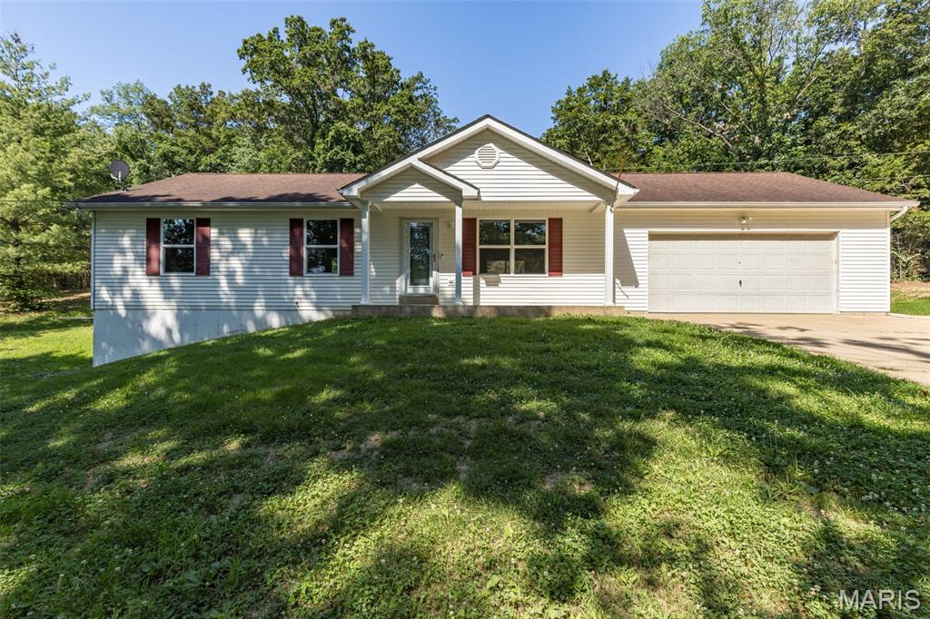 Completely renovated move in ready! Ranch home with oversized 2 car garage 3 bedrooms 3 bathrooms on large private lot. Located at the end of the street at the cul de sac, this home sits back off the street for a private yard. Enjoy the front porch with a beautiful glass entry door. Open floor plan for the living room, kitchen and dining. New kitchen cabinets, counter and appliances! Sliding glass doors lead to the patio and backyard with a wooded view. New floors, fresh paint, and new fixtures throughout! Primary bedroom suite features an updated bath with tile shower and has double closets. 2 bedrooms and full bath complete the main floor. Downstairs is a walk-out to a small patio, a full bath and a plenty of space for family rec room or extra sleeping space with full bathroom! Enjoy the nearly 1 acre park like setting! With above ground swimming pool and extra parking for all of your toys! Close to I-44 and shopping & restaurants in Washington or Union! 1 year Choice Home Warranty Included!  Call today for a personal tour!
