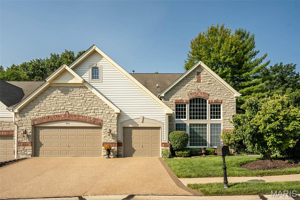 Sophisticated 1.5-sty villa extensively updated & stylishly appointed to accommodate daily comfort & gracious entertaining. Open floor plan features light-filled rooms with soaring ceilings, exquisite millwork, oak hardwoods & fine finishes throughout. Impressive entry foyer leads to formal dining room framed by architectural columns & coffered ceiling, elegant living room features 15’ coffered ceiling & a wall of windows & stunning 2-sty great room with Heat Glo fireplace flanked by built-in bookcases & dramatic wall of windows. Designer kitchen with glazed white cabinetry, suede granite countertops, premium appliances, framed trayed ceiling, customized double pantry & 9’ center island adjoins breakfast room with wine bar & sliding glass door that opens to expansive deck & overlooks open green space. Spacious primary bedroom suite offers a luxurious retreat with a wide bay window, a spa-like bath with a walk-in shower, his & her sinks & 2 customized walk-in closets. Large laundry room with access to primary suite. The 2nd floor extends the living quarters with 2 additional ensuite bedrooms & loft sitting area, providing comfort & privacy for family or guests. 3 car garage.  Enjoy low maintenance living in a premier 24 hour gated community just minutes from shopping, restaurants & parks with easy access to Hwy 40.
