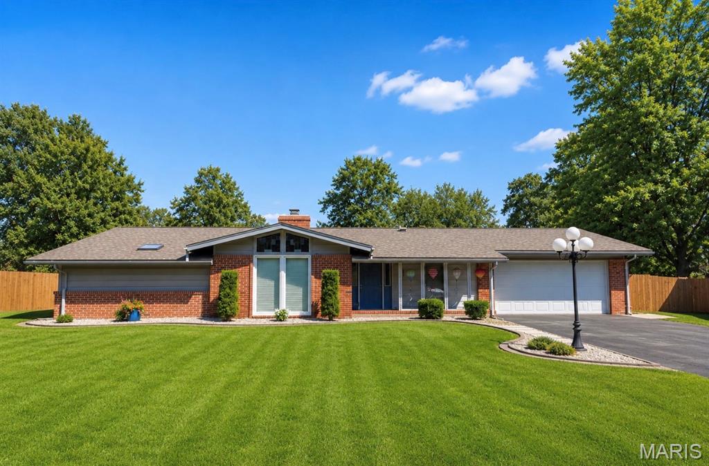 Welcome to 1504 Papillon Drive—where everyday living feels a little more like a retreat. This spacious ranch offers over 2,500 square feet with 4 bedrooms, 3 bathrooms, and a layout designed for both entertaining and unwinding.

The heart of the home features an open living area with hardwood flooring, abundant natural light, and easy flow into the updated kitchen with white cabinetry, generous prep space, breakfast area, and views of the backyard. A separate dining room offers flexibility for gatherings both large and small.

The private primary suite is its own retreat with a walk-through dressing area, dual closets, and an updated bath featuring vessel sinks and an oversized walk-in shower. Additional bedrooms offer comfortable space for family, guests, or work-from-home needs.

And then there’s the unexpected favorite—a dedicated hot tub retreat surrounded by windows, creating a year-round space to relax and recharge. Outside, enjoy the level yard, mature trees, and curb appeal that immediately feels like home.

Located in sought-after Robinwood West with access to neighborhood amenities including the community pool, Creve Coeur Lake & Park, with convenient access to shopping, dining, Parkway schools, and the best hospitals in the area—this one offers more than square footage… it offers a lifestyle.