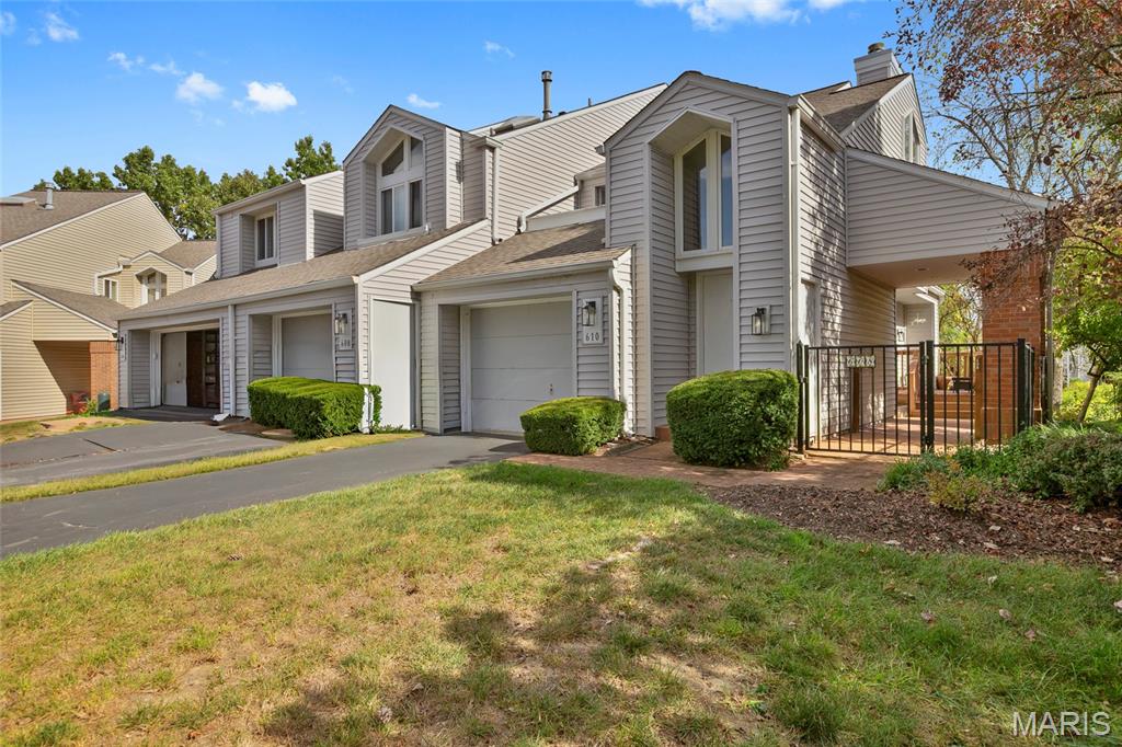 Welcome to this one of a kind condo in Ridgeview. You'll experience the elegance of the kitchen with 
top notch, upgraded appliances lots of cabinets with pull out drawers. Large pantry and lots of storage. The large, granite counter/breakfast bar has lots of appeal, can seat seat 6.  
See through wall to the huge living room with fireplace & lots of windows. Windowed doors to a large deck with some of the best views nature has to offer. 
The master bedroom suite is truly a WOW, accentuated by a Crystal Chandelier! Walk into the custom designed closet with pathway to a magnificent, one of a kind, elegant bath. You'll love the separate shower, tub and bidet. Not to be outdone, the hallway half bath is a designer's dream with a decorative sink and mirror.  Downstairs to a magnificent finished lower level. At the end of stairway, you'll find built-in for a library, hobby space or anything else you may desire. Expect to be 
"Wowed" when entering the lower level space which can be used as a bedroom, living area, office space or family room. This area also has lots of built-in features.  Direct access to a large patio area with a magnificent view and privacy. Don't forget to check out the full bathroom in the lower level.
It's top grade with designer touches as well. 
This community offers a clubhouse, large party room, pool, exercise room, kitchen and planned social gatherings. You'll love this lifestyle. 
Don't wait too long, this unique condo will sell quickly!