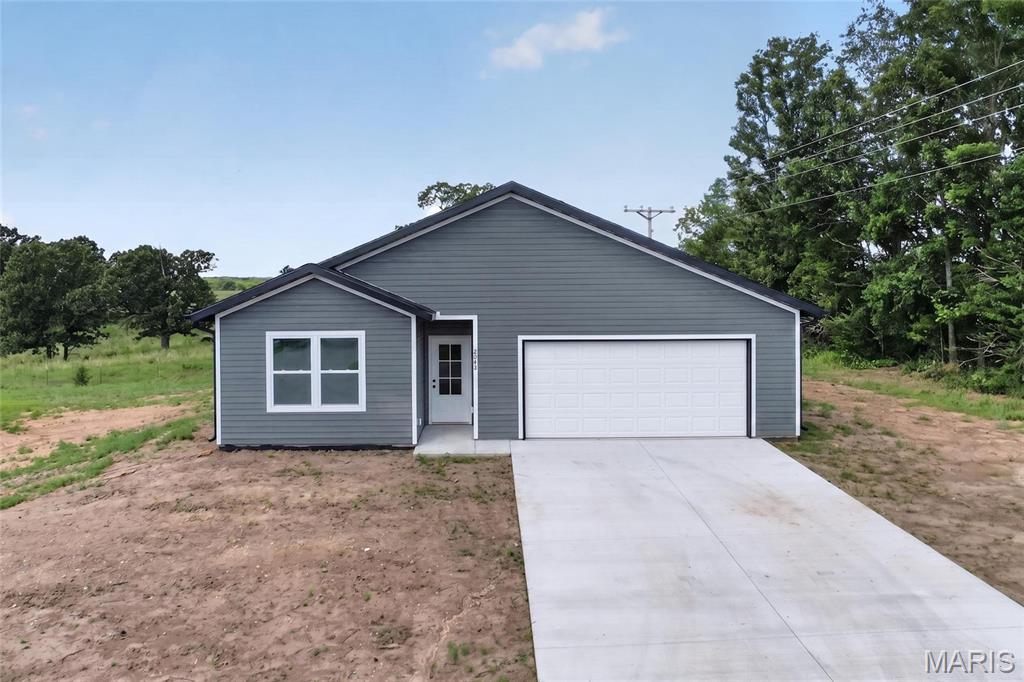 This brand new home offers 1,565 square feet of well-planned living space with a comfortable, open layout ideal for everyday living. Featuring 3 bedrooms, 2 full bathrooms, and a 2-car garage, the design combines functionality with clean, modern finishes. The primary suite includes a private bath and walk-in closet, while the secondary bedrooms provide flexibility for guests or a home office. Energy-conscious buyers will appreciate the inclusion of spray foam insulation, energy-efficient appliances, a high-efficiency HVAC system, and an ERV system, all working together to enhance comfort, minimize air loss, and help keep monthly utility costs manageable. With durable construction and low-maintenance features throughout, this home delivers efficiency, quality, and convenience in a desirable setting.