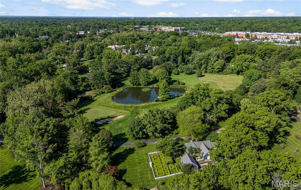 Duplicate property.  Very rare opportunity to own almost 11 acres off of coveted Warson Rd.  The main house, pool and pool house have been cleared.  The ultimate in privacy, a private drive takes you to this gorgeous gated property, which is not viewable from Warson.   A Pond, 1 hole practice 'golf course' and gorgeous guest cottage create a beautiful setting to build your dream home or your family compound.  Truly a once in a generation (or two) opportunity.