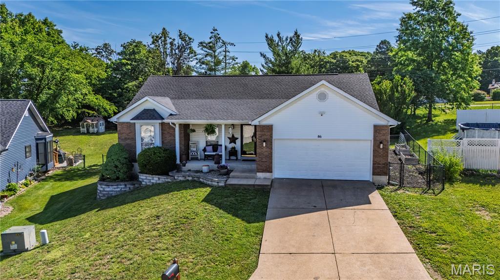 Spacious ranch home featuring a vaulted great room and kitchen with an open, inviting layout. This 4-bedroom home offers a cozy fireplace, new flooring, and a finished lower level complete with a family room, 4th bedroom, half bath, and additional storage area. The primary suite provides a private retreat, while the breakfast room adds extra dining space. Enjoy outdoor living on the deck and patio overlooking the fenced backyard with an above-ground pool, garden area, and storage shed. A newer privacy fence enhances the rear yard, creating a great space for entertaining, relaxing, and outdoor activities. Additional features include a 2-car garage and ample storage throughout. showings begin Friday 6/12/2026 .
