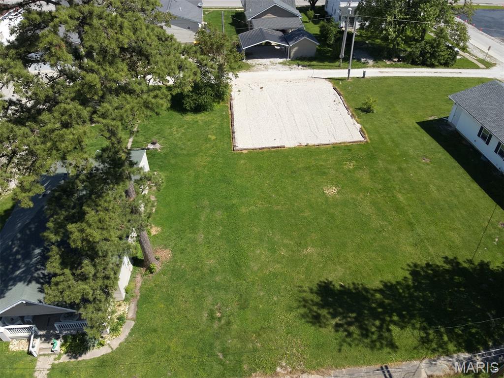 Build your getaway or forever home in the charming small-town community of Perry! This .22-acre lot offers a great opportunity for camping, a weekend retreat, or building the home you’ve always wanted. The property features both road and alley access, along with newly added gravel and a parking area for added convenience and usability.

Enjoy the peaceful hometown atmosphere Perry is known for while still being just minutes from the recreation, fishing, boating, and outdoor fun of Mark Twain Lake. Whether you’re looking for a relaxing escape, an investment opportunity, or a place to put down roots, this property offers the perfect balance of small-town living and nearby amenities. Don’t miss your chance to own a piece of Northeast Missouri!