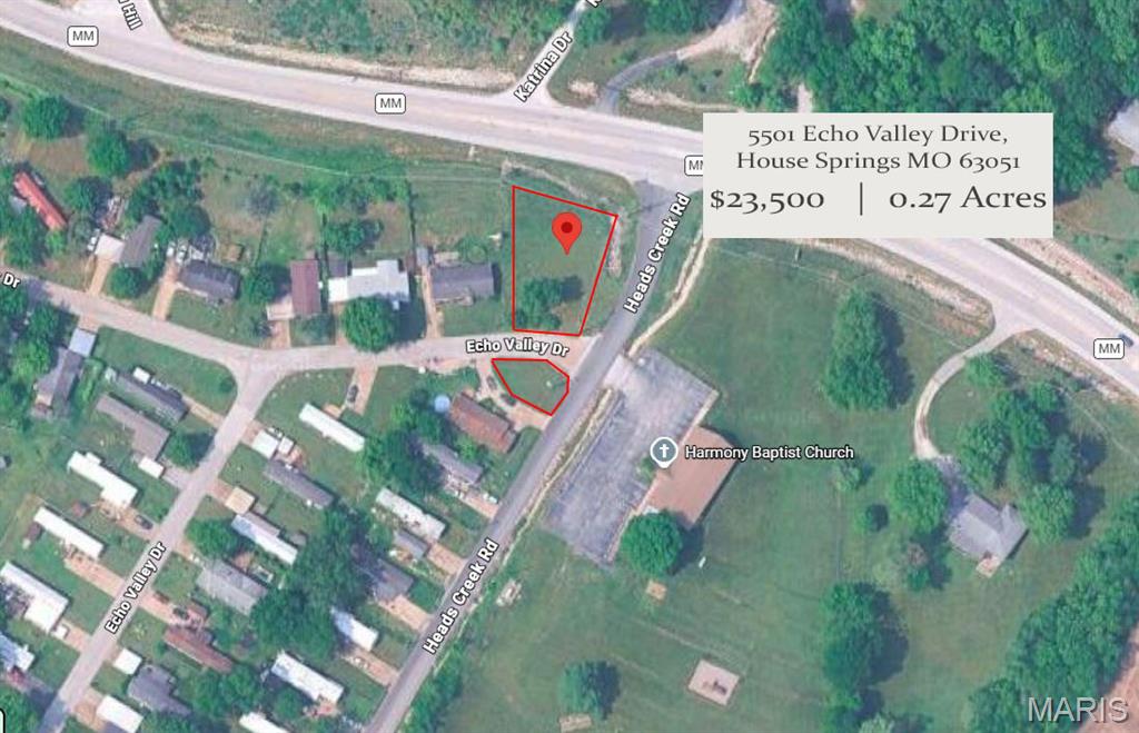 Beautiful corner lot located in the desirable Echo Valley Estates subdivision! This gently rolling property offers a nice mix of open space and scattered mature trees, providing the perfect setting for your dream home. Public water, public sewer, and electric service are available. Conveniently located just 9 miles from Highway 55, offering an easy commute while still enjoying the peace and quiet of a neighborhood setting. Bring your builder and your plans and start creating the home you've always envisioned!