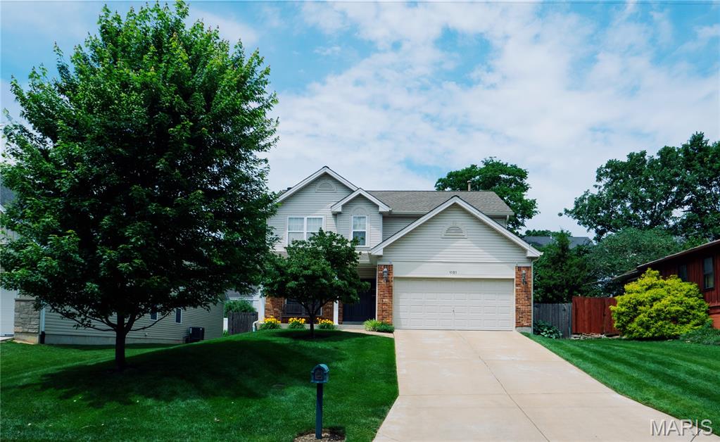 This Super-Sharp 4 Bedroom, 4 Bath, Des Peres 2-Story with over 3,200 sq. ft. of fresh, updated living space is the one you've been waiting for! An Inspiring Open Floor Plan, so perfect for everyday living, is equally superb for all types of entertaining. A sunny, spacious entry foyer with powder room and coat closet to one side and a formal dining room to the other, is your introduction to a smooth main-level flow offering that sense of simple, easy, transition from one light-filled room to the next. Meanwhile, the Chef in your life is about to meet their Dream Kitchen! Lengths of beautiful granite work surface, stainless appliances, 42" custom cabinetry, center island with breakfast bar; and if, as they say, the kitchen is the heart of the home, our long planning desk with storage above and below must be its well-appointed nerve center! The adjoining breakfast room will accommodate your "long" table and both looks into the inviting Great Room and out glass doors to the lovely patio and yard surrounded by privacy fencing. The stunning Great Room will both beckon and embrace you in the comfort of your favorite music, movies, sports viewing, board games or just snuggling up to the hearth for a cozy evening in front of the fire. Another huge freshly updated 21x15 Family Room + office with built-ins off to the side awaits in the lower level, along with an additional bonus room to do with what you will + a 2nd powder room. The primary upstairs en suite features a coffered ceiling, walk-in closet, and a full bath featuring vaulted ceiling, double sink vanity with dressing table, separate tub & shower. 3 additional upstairs bedrooms are all spacious & sunny with roomy closets. A full upstairs hall bath completes a smart 2nd level layout. Nestled in one of St. Louis metro's most sought-after communities, this home sits directly across the street from darling Harwood Park, which offers a lush greenspace view from your front window. Spotless and Lovingly Maintained & Updated, so close to great schools, great shopping and great restaurants, you'll immediately know you've found it! Better Hurry!!