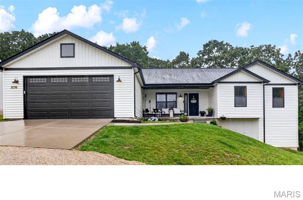 Your peaceful retreat awaits, nestled against a private wooded backdrop—no cookie-cutter here. This modern 3-bed, 2-bath home (plus a roughed-in lower-level bath option) offers over 1,600 sqft (main level) of thoughtfully designed space. The vaulted primary suite is a standout, with a glass-door shower and double vanity. Step out from your walkout lower level right into that serene wooded view. The fenced backyard is ready for your gatherings or quiet moments. And rest easy—your HVAC, water heater, and roof are barely two years in. Plus, you’re just a stroll away from local gems like Toasted Coffeehouse and Pegg’s Pizza. A perfect blend of comfort, character, and convenience—ready for you to make it home.