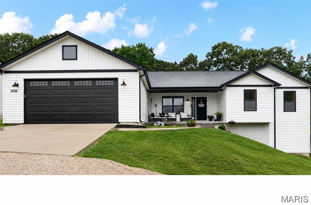Your peaceful retreat awaits, nestled against a private wooded backdrop—no cookie-cutter here. This modern 3-bed, 2-bath home (plus a roughed-in lower-level bath option) offers over 1,600 sqft (main level) of thoughtfully designed space. The vaulted primary suite is a standout, with a glass-door shower and double vanity. Step out from your walkout lower level right into that serene wooded view. The fenced backyard is ready for your gatherings or quiet moments. And rest easy—your HVAC, water heater, and roof are barely two years in. Plus, you’re just a stroll away from local gems like Toasted Coffeehouse and Pegg’s Pizza. A perfect blend of comfort, character, and convenience—ready for you to make it home.