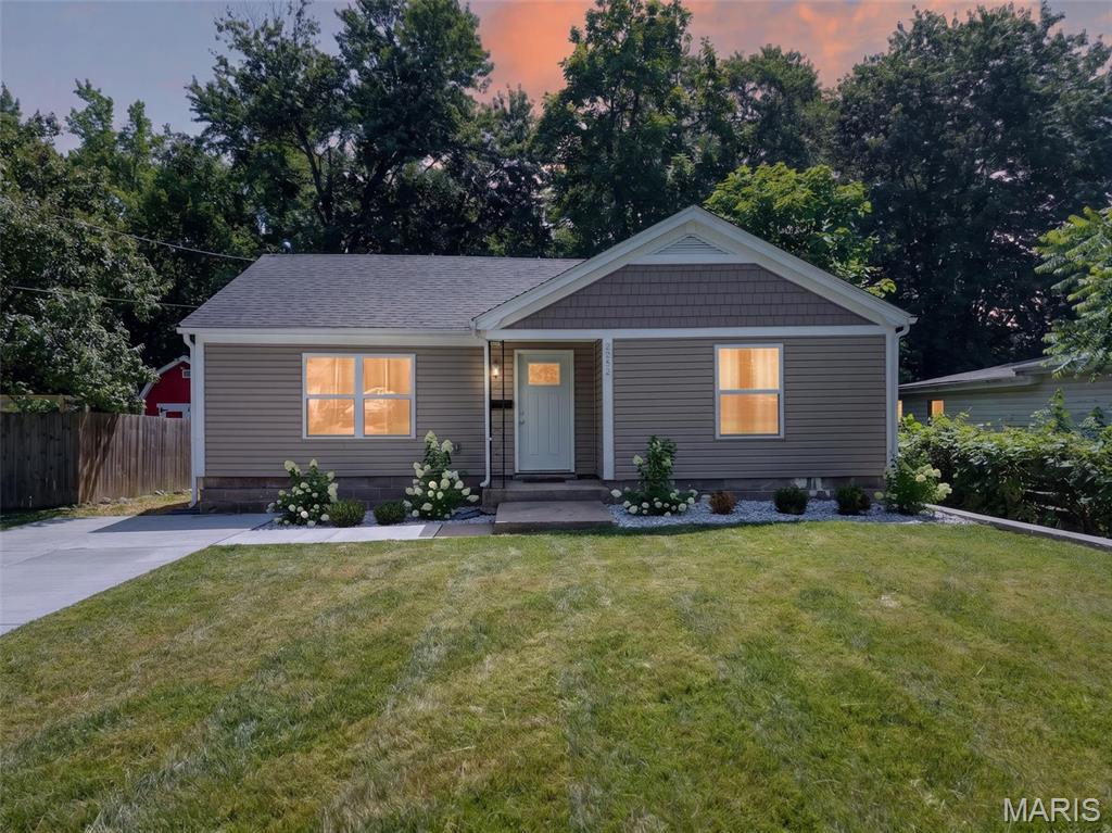This charming 2 bed, 1 bath bungalow is perfectly tucked away in a DREAM location minutes away from Historic St. Charles and it is ready for you to make everything yours! Instant curb appeal with thoughtful landscaping! Inside is a welcoming open floorplan that will be the focal point of all entertaining! Tons of natural light and luxury vinyl plank flow from the living room into the gleaming kitchen featuring white shaker cabinetry with chic brass fixtures and stainless steel appliances! Two large bedrooms offer plenty of room for a home office or reading nook and the bathroom has been updated for a beautiful shine. Outside spend the rest of the summer kicked back with a cool lemonade under the shade of mature trees! This home has also been updated with a newer hwh (2024). Such an amazing canvas to build your dream home with! Don't let it slip through your fingers! Schedule your private showing today!