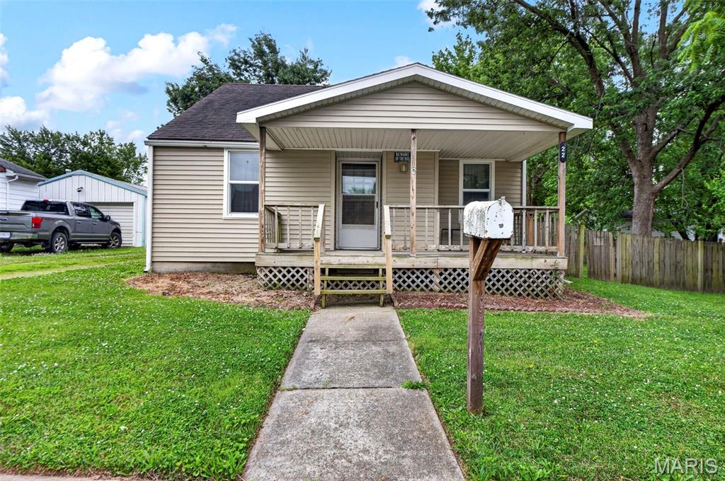 Beautifully updated and impeccably maintained, this charming Bowling Green home offers a rare combination of comfort, efficiency, and value. Thoughtful improvements, including newer windows, central air, sump pump, and a high-efficiency Lennox furnace, provide peace of mind and modern convenience. Natural light fills the inviting interior, creating a warm and welcoming atmosphere throughout. The full basement offers exceptional storage and expansion potential, while the oversized detached 2-car garage provides ample space for vehicles, hobbies, and equipment. Enjoy quiet mornings and relaxing evenings from the covered porches overlooking the well-kept property. Ideally located near schools, parks, downtown shopping, dining, and community amenities, this home delivers small-town charm with everyday convenience. Whether you're a first-time buyer, downsizing, or investing, this property is a must-see opportunity in one of Bowling Green's most desirable neighborhoods.