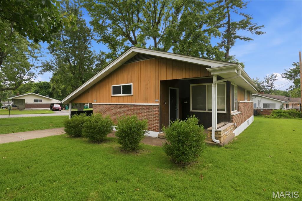Discover the charm of 9731 Lanier DR, STLS MO 63136, a single-family residence built in 1954, offering a unique opportunity for comfortable living. This home provides three well-proportioned bedrooms, each designed to offer a personal retreat. The single bathroom is thoughtfully appointed to serve the household's needs. Further enhancing the property's appeal are practical features such as a functional basement, an attached carport for convenient parking, and a welcoming patio perfect for outdoor enjoyment. To truly appreciate the potential of this inviting property, schedule your private viewing today.