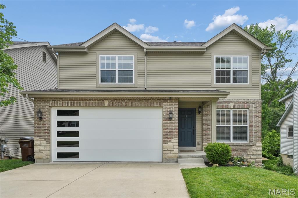 Newer four-bedroom, 2.5-bath two-story home in Ladue Schools, south of Olive near Villa Park.  Offering approximately 2,315 square feet of finished living space, including the finished lower level. Recent updates include a new roof (2025), water filtration system (2025), garage door (2022), remodeled kitchen and baths (2020), finished lower level (2020), electric subpanel (2020), and custom primary closet (2020). Additional features include luxury vinyl tile flooring throughout , and ceramic tile in baths, a low-maintenance deck, sprinkler system, walk-in pantry, gas fireplace with marble surround, and an updated kitchen with white cabinetry, granite center island, GE appliances, and tile backsplash. Upper level includes four bedrooms and two full baths.  Beautiful level wooded back yard backing to Villa Park. Convenient to highways, the airport, restaurants, shopping, and Clayton. Three new homes have sold on same block in 2022-2023 between $803,000-$1,000,000. Comparable to new construction at a fraction of the price—move-in ready and a best buy!