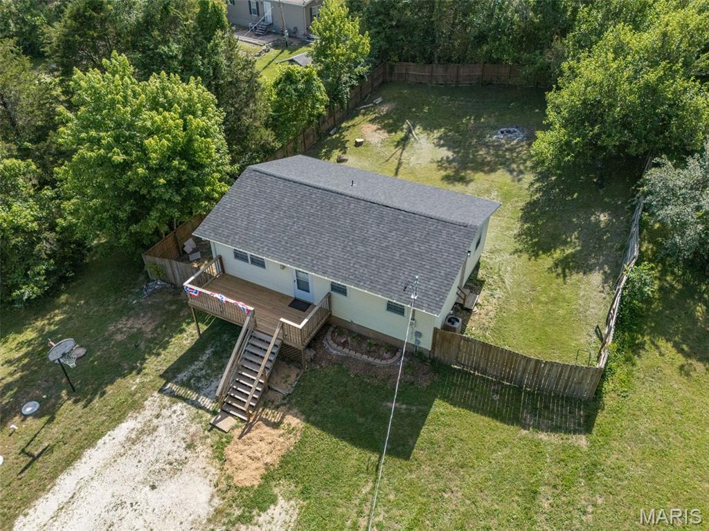 How about this??? Sellers are AWESOME!  They are offering $5000 toward buyers closing costs/rate buydown or whatever they need!  I asked "What else ya got??" And they said "Let's throw in a Home Warranty, too!!! Y'all are simply NOT going to find a Seller ready to make a Buyer happy like this!! Welcome to 13071 Hencher Rd in De Soto, MO—a fully renovated 2-bedroom, 1-bath home offering comfortable single-level living with thoughtful updates throughout. Inside, you'll find updated flooring, fresh finishes, an inviting living room, and a bright eat-in kitchen featuring updated countertops, subway tile backsplash, stainless steel appliances, and abundant cabinet space. The remodeled bathroom showcases modern tilework and updated fixtures. Both bedrooms offer comfortable layouts and natural light. A partially finished basement provides flexible space for a home office, recreation area, hobby room, or additional storage. Outside, enjoy a newly built entry deck and a fenced backyard with plenty of room for outdoor activities, gardening, or pets. New garage door, Exterior doors and walkout basement goes to the garage. Conveniently located near downtown De Soto shopping, dining, and community amenities, with quick access to Highways 67 and 21 for commuting. Situated within the De Soto School District and offered vacant for immediate occupancy. Virtually staged photos included to help showcase the home's potential.