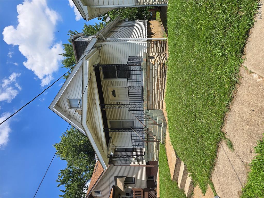 Bevo Beauty!!!! Home features original floors, detached garage, a large 2nd floor rec room or HUGE bedroom. Property needs some TLC to make it home but wont take much! Bring us your vision for a plan and bring this home back to its former beauty! Perfect for a buyer who sees a little sweat equity upside or an investor looking for a flip or rental portfolio.