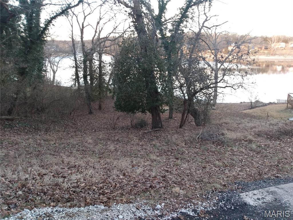 Escape to your own private paradise! This rare lakefront double lot offers stunning views and direct access to a pristine 100-acre lake—right from your backyard! Located in a private gated community with very few listings available, this is your chance to own a piece of serenity and adventure. Enjoy over 600 acres of private community land for hiking, hunting, ATV trail riding, and exploring nature at its best. This community also features a well-maintained beach, shooting range, clubhouse and entertaining area, perfect for gatherings or quiet relaxation. Whether you’re looking to build your dream home, a weekend retreat, or an investment in lifestyle, this property delivers the ultimate blend of privacy, recreation, and natural beauty. Opportunities like this are rare—don’t miss out on making this lakeside haven yours!