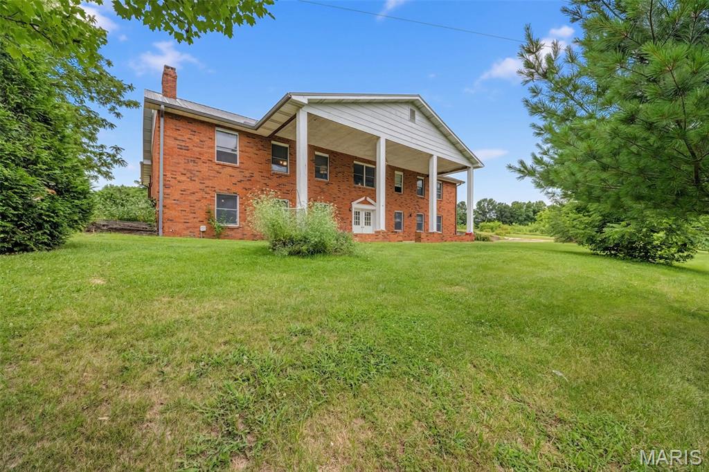 Escape to the peace and privacy of the country living with this 5-bedroom, 3.5 bath home situated on 10 beautiful acres.  This property offers the perfect blend of comfort and outdoor living, featuring a scenic pond and a large shed for storage, hobbies, or workshop area.  Inside, you will find plenty of room for family and guests with a functional layout designed for everyday living.  Whether you're looking for space to enjoy nature, start a hobby farm, or simply relax in the quiet setting, this property has endless possibilities.
