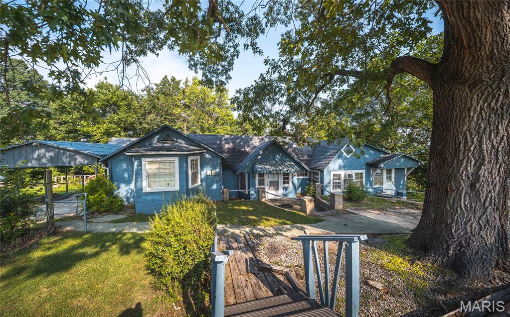 Step back in time and discover the incredible potential of this one-of-a-kind historic home overlooking the breathtaking Gasconade River. Nestled on a picturesque lot, this spacious 5-bedroom, 3-bath residence offers a rare opportunity to restore a timeless treasure while enjoying peaceful river views and the beauty of nature right outside your door. Built in 1930, this home is filled with architectural charm that simply can't be replicated. Original hardwood flooring, stunning beamed ceilings, and four wood-burning fireplaces create a warm, inviting atmosphere full of character and history. Every room tells a story, offering endless inspiration for those with a passion for restoring classic homes to their former grandeur. Outside, the property is equally captivating. Gather with family and friends on the patio, unwind beneath the gazebo featuring its own outdoor fireplace, or simply take in the tranquil setting overlooking the Gasconade River. The expansive acreage provides room to garden, entertain, or simply enjoy the privacy and serenity of country living while remaining within a convenient drive to nearby amenities. Whether you're searching for a forever home, a restoration project, or a truly unique property with unmatched charm, this historic gem is ready for its next chapter. Don't miss your chance to own a piece of history—schedule your private showing today and imagine the possibilities waiting for you.
