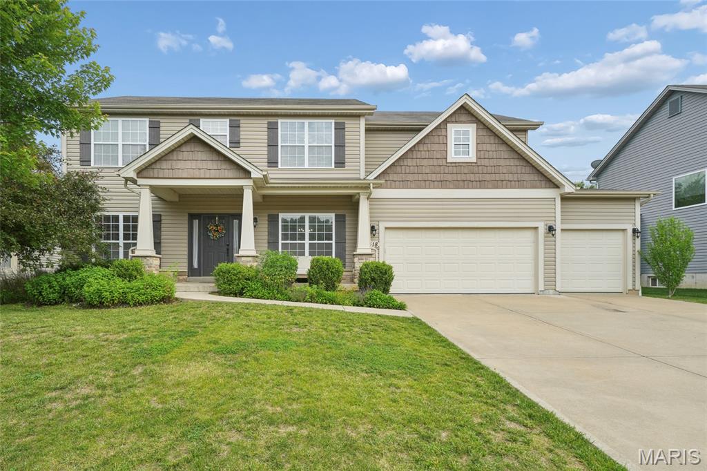 This beautiful two-story home is the one you’ve been waiting for! As you come inside from the covered front porch, you’ll find a bright, light-filled office where you’ll love working from home. Continue through to a warm, inviting family room with a cozy gas log fireplace. The kitchen at the heart of the home is equipped to cater any meal with stainless appliances, granite counters, tons of cabinet space, a pantry, and center island. It’s open to the breakfast room for casual dining, or there’s a separate dining room too for celebrations and more formal meals. Head outside for summer barbecues on the patio and enjoy the level, fenced-in backyard with the whole family. A half bath and convenient main floor laundry room round out the main floor. At the top of the stairs, you’ll find an open flex room which could make a great play room, living room, or whatever else suits your needs. The spacious primary bedroom suite features a luxurious bath with a separate soaking tub, dual sink vanity, and a huge walk-in closet. The other three bedrooms, down the hall for privacy, all have ample closet space and share the hall full bath. Downstairs, the lower level is a blank canvas to finish to your taste, with a roughed-in bath and egress to give you a head start! To top it off, a three-car garage gives you plenty of parking space!