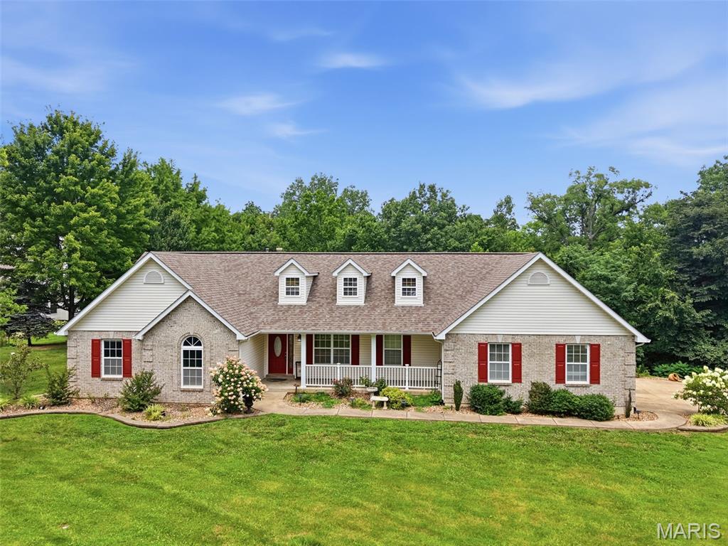 HIDDEN GEM! Big lot, Big floor plan, Big energy! This stunning Atrium Ranch is bringing all the right features with 5 bedrooms, 3 baths in over 2,700+ square feet of room to live in on a level 1 acre lot backing to beautiful woods that provide privacy on a corner lot! Inside, you are treated to an open floor plan, a wall of windows for natural light, soaring vaulted ceilings, newly installed gleaming wood floors, and a brick wood-burning fireplace to make it all cozy as we count down the days to spooky season! We can't stop there; the kitchen is made to WOW with custom 42" cabinets, granite counters, stone backsplash, and custom stone breakfast bar overlooking the breakfast room, the MASSIVE covered deck & backyard with space for your dream garden, activities like making smores, or relaxing in the sun! Escape to the serene primary suite, where an elegant coffered ceiling creates a bright, airy atmosphere and the spa-like ensuite pampers with a custom-tiled shower, separate jetted soaking tub, and adult height dual granite vanity! Three more large bedrooms and a 2nd full bathroom on the main level provide all the room you could need but wait - There's MORE! Downstairs in the lower level, you have a huge Rec Room to host a perfect movie or game night, a FIFTH bedroom that can easily become your home office, reading nook, or hobby room! The basement also makes entertainment a breeze with the 3rd full bathroom! This home also boasts a 3 car garage and convenient main floor laundry. 119 Saint Marys has is all - and more! Freshly painted throughout with newly installed hardwood floors & carpet! Schedule your private showing today!