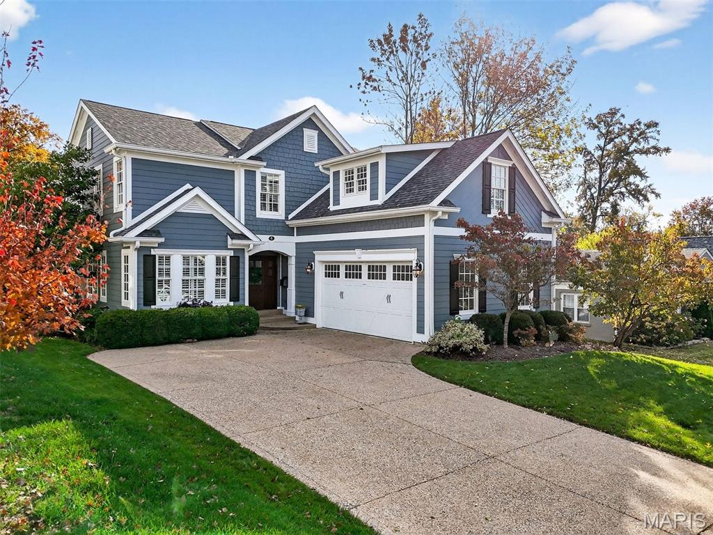 Located in the highly sought-after Clayton Road Park neighborhood, this Ladue residence offers 4 bedrooms, 3.5 baths, and an open-concept layout. The main level stuns upon entry with gleaming hardwood floors, gorgeous moldings, recessed lighting, tall ceilings, and plantation shutters. The great room features built-in shelving surrounding the gas fireplace, a dining area that will comfortably seat family and friends, whether casual or formal, and a wall of windows and French doors that open to a private, professionally landscaped patio and yard. Entertaining is a breeze in the spacious kitchen, featuring stainless steel appliances, granite countertops, a center island, a pantry, and ample cabinet space. The main level primary suite features a walk-in closet and French doors opening to the patio. A convenient powder room and laundry room complete the first floor. Upstairs, you will find three bedrooms with incredible closet space, a Jack-and-Jill bath, another full bath, and a spacious loft area with built-in bookshelves, adding more versatility and making it perfect for a playroom, TV room, or study area. The finished lower level adds 1,000 square feet of recreation space. Walking distance to Ladue High School, Ladue Middle School, and Conway Elementary, as well as numerous restaurants and shops.