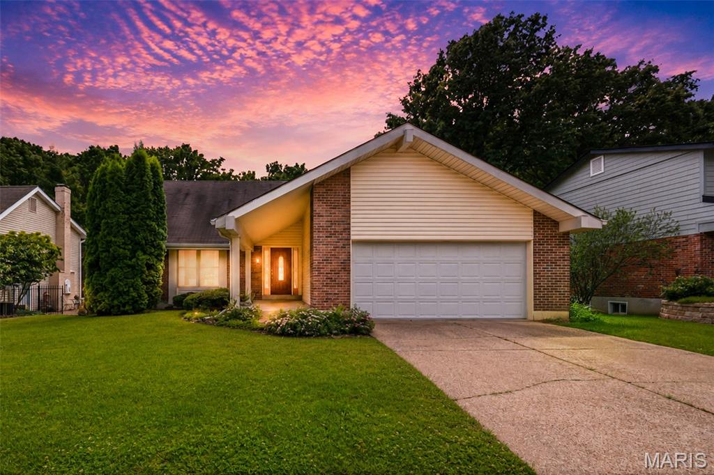 Here's your chance to own in one of West County's most desirable neighborhoods — Fox Glen in the Parkway West School District. This 4-bedroom, 2.5-bath split-level sits on a well-landscaped lot with a beautifully curbed street presence and is loaded with character: soaring vaulted ceilings with exposed wood beams, a dramatic two-story entry, hardwood floors in the family room, a classic brick fireplace, and a kitchen with brick accent walls and a serene garden window view. The finished basement adds versatile bonus space, and the 2-car garage rounds out this solid home. Enjoy a private backyard with a concrete patio — perfect for entertaining. Walk or drive minutes to Queeny Park, and enjoy quick access to the restaurants, shops, and nightlife along both Clayton Rd and Manchester Rd. Sold strictly As-Is — seller to provide no inspections, make no repairs, and offers no warranties. Tremendous potential at the right price point. Schedule your showing today!