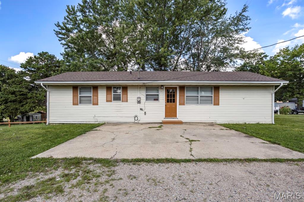 Situated on a corner lot in Dixon, this 3-bedroom, 2.5-bath home offers plenty of space and flexibility to fit a variety of needs. The main level features a comfortable front living room, an open kitchen and dining area that's great for everyday living, and a primary bedroom with an attached half bath. Downstairs, the basement provides a tuck-under garage, and two partially finished bonus rooms that could be used as an office, hobby room, home gym, or additional storage (rooms do not have windows and are not considered bedrooms). With a functional layout, generous space, and a convenient corner lot location, this home is ready for its next owner.