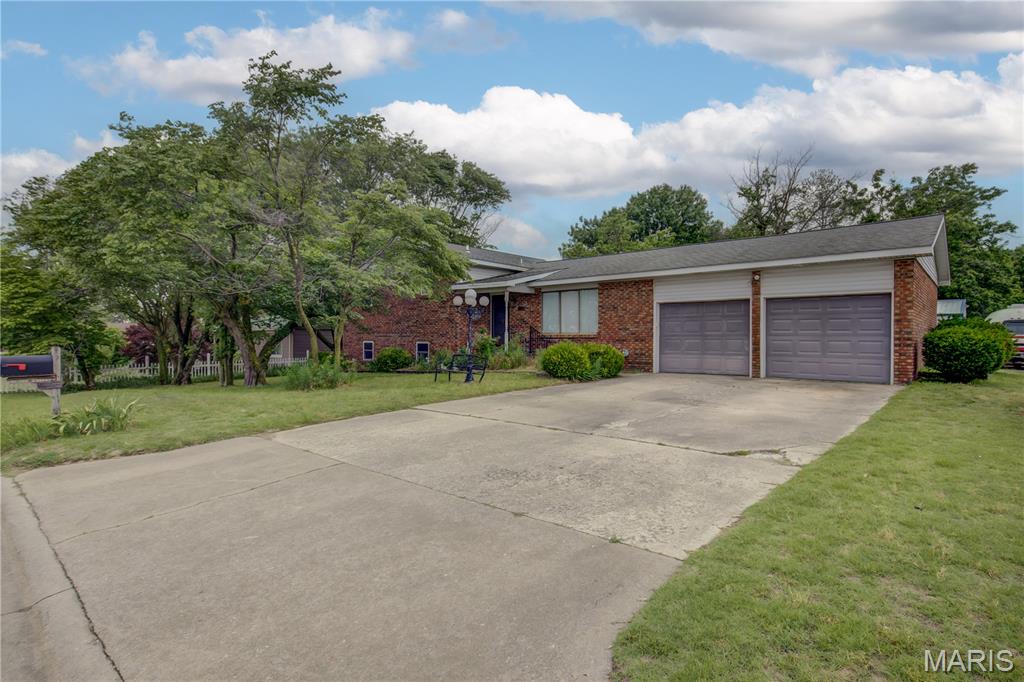 Large home seeking new owners!!!!  This 4 bed 2.5 bath home has all the space if you have the vision!!!  This beautiful brick split level home boasts a large living area and kitchen with eat in dining in the main level.  On the upstairs split level section you have 3 large bedrooms and 2 large baths.  Downstairs you have a huge family room, half bath, laundry room and bedroom.  The home has a ton of space for a growing family or someone needing more space!  Home does need some updates but some things have already been done!  Including new show install in the primary and the HVAC system is only 4 years old! There is also an attached garage and a 24 X 40 shop in the back, so tons of storage!!  And at this price it will not last long!!!  Schedule your tour today!!!