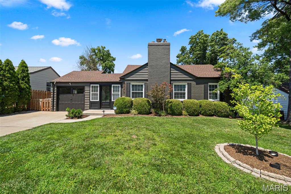 Set on a quiet street in the heart of Glendale, this thoughtfully updated 2-bedroom, 2 full bath home blends everyday comfort with a true sense of community in one of St. Louis’ most cherished walkable neighborhoods. A light-filled breezeway welcomes you with direct access to the attached garage and backyard, and flows naturally into the warm, inviting main living space with luxury plank flooring throughout. The open flow continues from the living room - anchored by a gas fireplace - into the beautifully updated dining and kitchen area featuring custom cabinetry, granite countertops, stainless steel appliances, a gas cooktop with convection oven, pantry, and a newer sink and refrigerator. The main level bath has been fully renovated with modern finishes for a clean, refreshed feel. The finished lower level expands the living space with a sizable rec room, polished concrete floors, an updated full bath, laundry room, custom cabinetry and storage. Outdoors, a level fenced backyard offers a private deck and dedicated firepit patio area ideal for gathering or quiet relaxation. Additional features include a new roof (2024), interior/exterior paint (2024), HVAC system and water heater (2022), front door (2026), insulated windows, garage door/drywall/lighting, irrigation system, and hardwired landscape lighting.  Just moments from North Glendale Elementary and within easy walking distance to the neighborhood coffee shop, a beloved local deli, boutique grocery options, and year-round community events. This home captures the best of both worlds - a small-town atmosphere with convenient access to the additional amenities of Kirkwood and Webster Groves, all complemented by a central location that makes enjoying the greater St. Louis area effortless.
