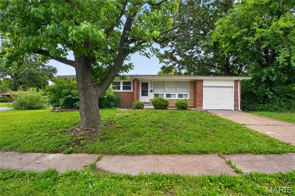 Welcome to 1500 Highmont DR, STLS, MO 63136, a single-family residence constructed in 1957, presenting an inviting home ready for immediate occupancy. This property offers a compelling opportunity for those seeking a harmonious blend of comfort and functional design. The kitchen, thoughtfully designed with a peninsula, seamlessly integrates into an open-plan layout with the living room, fostering an ideal environment for both daily living and entertaining. This ranch-style residence features three well-proportioned bedrooms and a complete bathroom. Additional amenities include a private yard, an attached garage, and a basement, providing versatile space for various needs. We invite you to schedule a private viewing to experience the distinctive appeal of this residence.