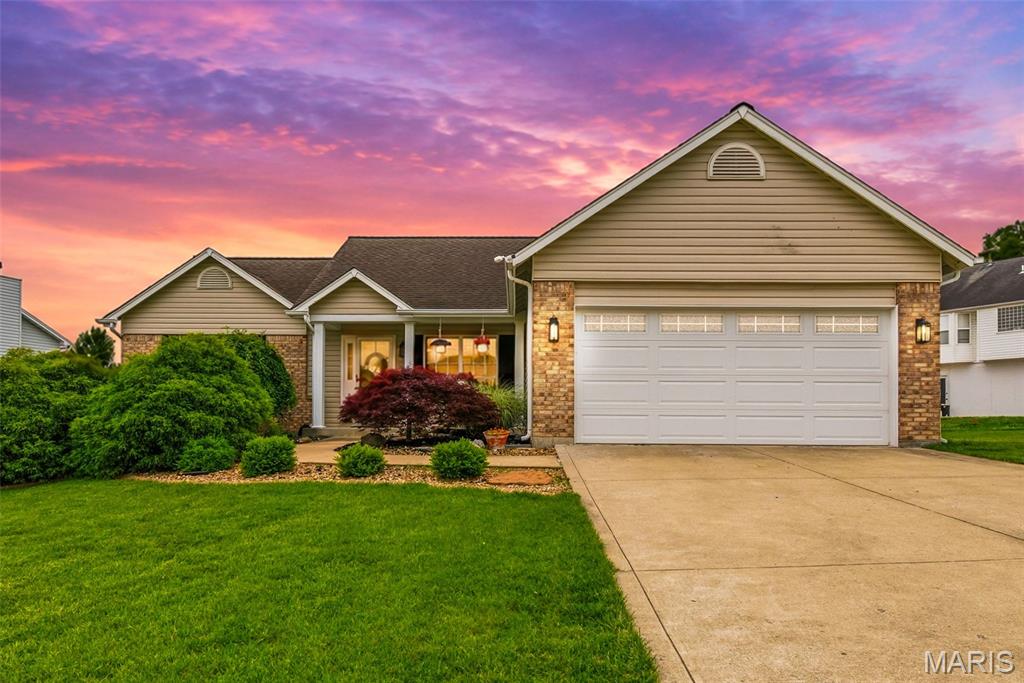 Opportunity is knocking again! This home was quickly spoken for twice and is available once more due to buyer circumstances. The next buyer will have the added benefit of a recently completed professional home inspection. Inspection report available upon request after touring the home.  Open-concept vaulted (3) split-bedroom floorplan ranch located in Post Meadows Subdivision, just four doors from the 215-acre WingHaven Golf Course, featuring beautiful updates, brand new carpet and fresh paint throughout. Professional landscaping and a covered front porch create inviting curb appeal. The vaulted great room offers a cozy wood-burning fireplace and flows seamlessly into a spacious eat-in kitchen with abundant cabinetry, thoughtful organization, and chef’s gas cooking. Sliding doors lead to a custom block patio—perfect for entertaining—with a piped gas line for outdoor cooking.

A flexible formal dining area provides additional space for gatherings or everyday living. The vaulted primary suite includes a walk-in closet, double vanity, tub, and separate shower. Convenient main-floor laundry adds ease to daily routines.

The expansive lower level offers a bath rough-in, making future finishing simple and customizable. Enjoy a fenced backyard with an irrigation system, ideal for maintaining the beautifully landscaped grounds. Ideally located near parks, shopping, dining, and everyday conveniences.