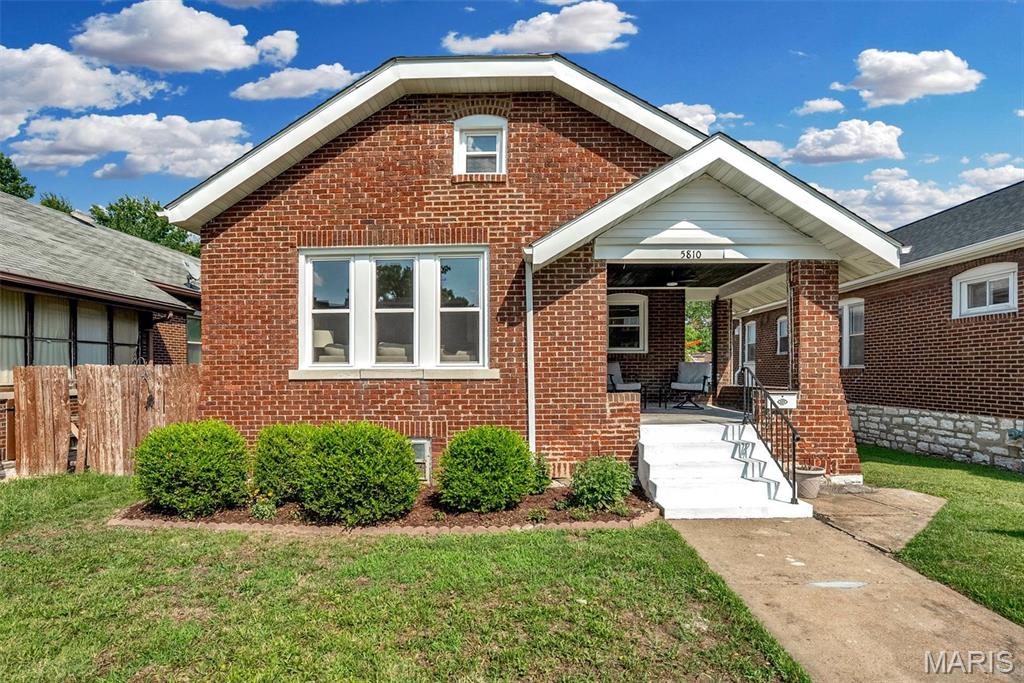 Welcome home to this charming and beautifully updated brick bungalow in the heart of South City! Conveniently located within walking distance to restaurants, schools, shopping, and parks, or enjoy a quick bike ride to the iconic Ted Drewes Frozen Custard.

This spacious home offers 4 bedrooms, 1.5 bathrooms, and a long list of recent updates, including a new roof, new windows, a stunning new kitchen, and updated bathrooms. The inviting covered front porch is the perfect place to enjoy your morning coffee, while the bright sunroom provides additional living space to relax year-round.

The full basement offers abundant storage and the potential to finish additional living space or add another bedroom. Outside, you'll appreciate the 2-car parking pad off the alley for convenient off-street parking.

Combining classic South City character with modern updates and an unbeatable location, this home is ready for its next owner to move right in and enjoy!