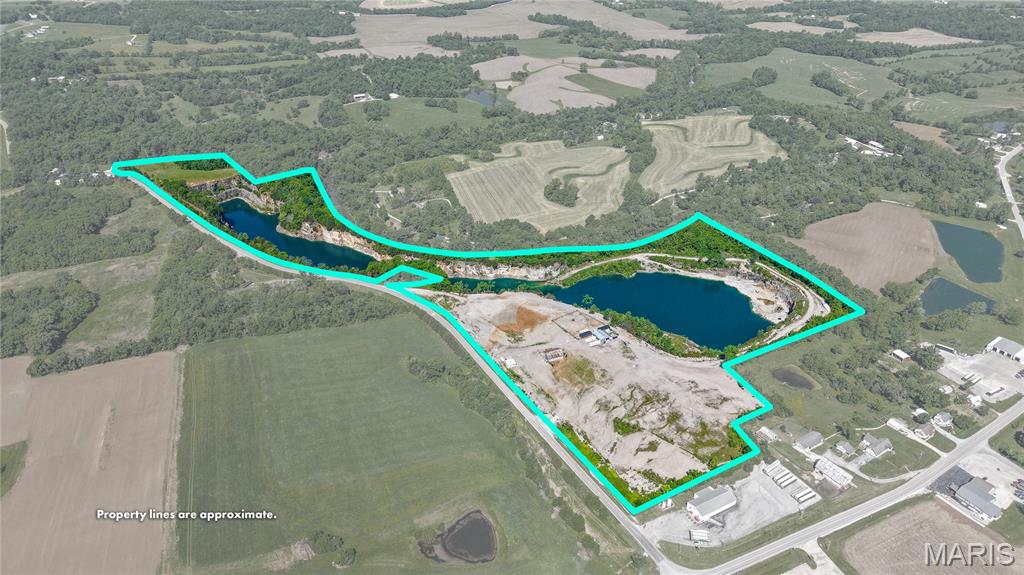 Opportunities like this don’t come around often. This approximately 50-acre former quarry has been thoughtfully transformed into a striking recreational property centered around a stunning 20± acre private lake.

With dramatic terrain, deep water, and a setting that feels miles away from everything, this property offers a rare blend of natural beauty and untapped potential. The current owner has made meaningful progress in improving the site, creating a strong foundation for the next owner to take it to the next level.

Whether you're looking for a private weekend retreat, a future homesite overlooking the water, or a unique commercial venture, the possibilities here are wide open:

Recreational getaway or family compound
Second home or cabin development site
Winery, brewery, or event venue destination
Fishing retreat with tournament potential (stocked lake)
Scuba diving training site or outdoor adventure concept

The lake itself is the centerpiece—clean, stocked, and surrounded by rugged quarry features that create a one-of-a-kind backdrop you simply won’t find in a typical rural property.

If you’ve been searching for something different—something with character, scale, and vision—this is it.