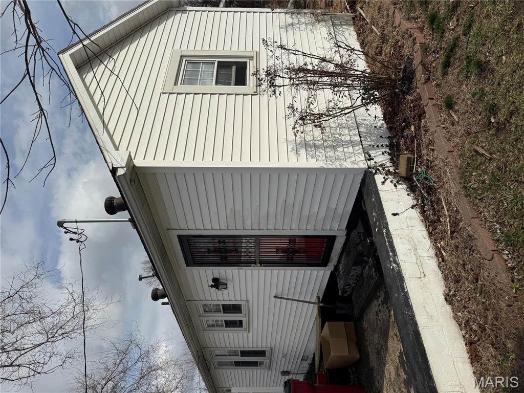TWO BEDROOM HOUSE LOCATED ON A LARGE CORNER LOT WITH 3 EXTRA VACANT LOTS INCLUDED, ALONG WITH TWO DETACHED SHOPS