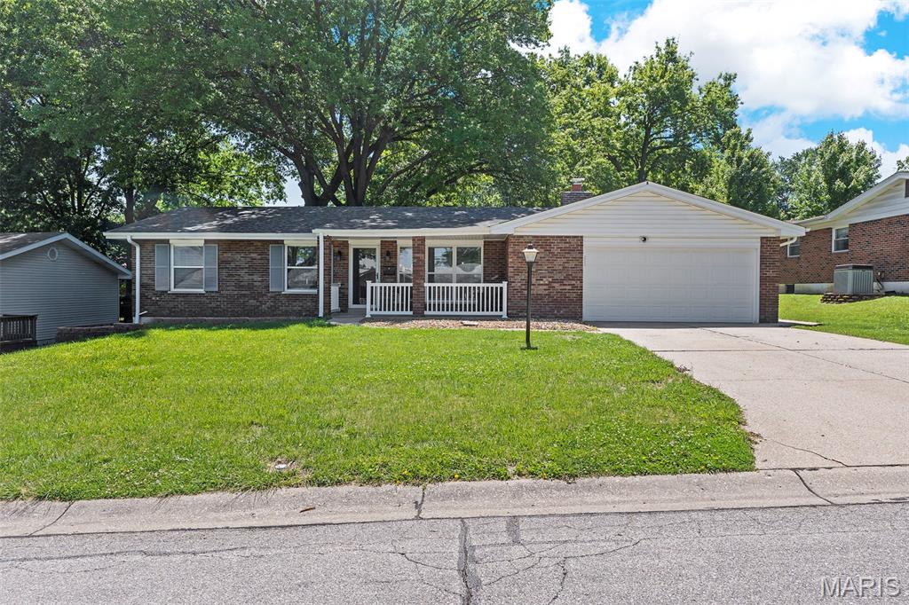 Awesome opportunity St. Charles! Welcome to this beautifully maintained Brick Ranch-style home! Nestled in a quiet established neighborhood, this home offers comfort, style and functionality!  Welcoming layout designed for modern living. The eat in kitchen features granite countertops, a center island and ample cabinet space-perfect for cooking, entertaining, and everyday life. Main floor boasts a spacious living room & family room to relax or gather with loved ones around wood burning fireplace.  3 bedrooms including a master suite and an additional full bath round out the main floor living area.  Walk outside to the covered patio and fenced backyard offers room to play and tons of shade.  Finished walk out basement ideal for a great room, home office, workout area or guest space.  Covered front porch as well so you can find shade any time of day or enjoy a rainy day.  Freshly cleaned carpets.  2 car garage and plenty of driveway space.  Roof is just 2 years old.  This home has so much to offer.  Come and see it before it is gone!