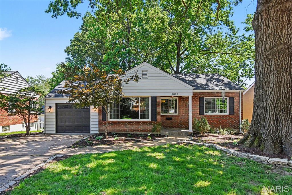 Missed It the First Time? Here's Your Second Chance! Back on the Market! Buyer's Cold Feet Is Your Opportunity! 

Welcome to 1310 Lanvale Drive, ideally located in Webster Groves. This home blends classic character with thoughtful updates in an unbeatable location near parks, shopping, dining, and the award-winning Webster Groves School District.

Step inside to a bright and inviting living room featuring a large picture window that fills the space with natural light. Gorgeous hardwood floors flow throughout the living room, dining room, hallway, and both bedrooms, creating a warm and cohesive feel. The beautifully updated kitchen is sure to impress with 42-inch white cabinetry, quartz countertops, ceramic tile flooring, a pantry, and stainless steel appliances including a gas range, microwave, and dishwasher. The spacious family room offers the perfect place to gather and unwind, highlighted by a gas fireplace with a custom stone surround that serves as the room's stunning focal point, and new lvp flooring. A beautifully renovated hall bath completes the main level.

The lower level expands your living space with a massive recreation room featuring ceramic tile flooring, custom brick wall, built-in shelves, and plenty of room for activities. There’s also a dedicated office or additional sleeping area, as well as a large, updated full bath, laundry room, and storage area.
Step outside to enjoy the multi-level deck overlooking the fenced backyard, complete with a storage shed and treehouse, providing plenty of room for outdoor entertaining, play, and relaxation.

This move in ready home offers the opportunity to enjoy everything Webster Groves has to offer.