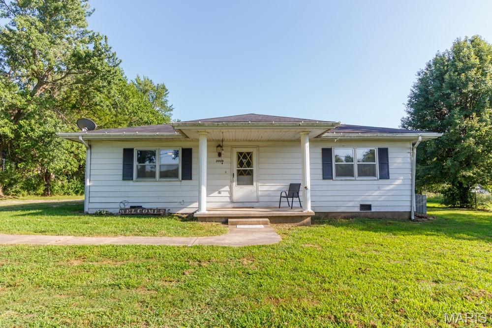Looking for a Home on Small acreage just outside the city ?  This hone offers space around you with nearly 3 acres.  ( 2.87) ml Mostly open. Close to town and on Blacktop 
This oversized Large 2 bedroom home has all new LVP flooring throughout.  All new interior paint.  2 baths, 2 car garage. Older barn.  Plus a Storage shed. The Hallway Bath is very large offers OVERSIZED double vanity 
 This place is great  for a couple of horses , or calves. 
Lots of storage oversized laundry room.  additional bath room off the garage.  Aluminum Siding Exterior. 
County water. County Sewer.