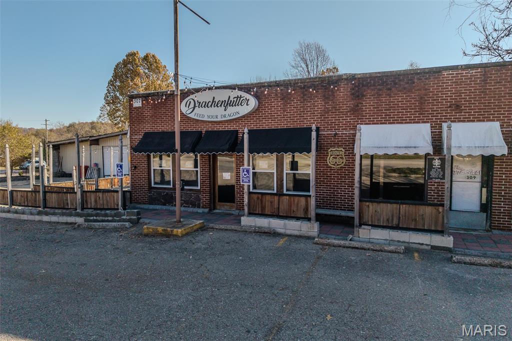 Don’t miss this rare opportunity to own a landmark property on America’s most famous highway! Ideally located along the iconic Historic Route 66 in the heart of Waynesville, just in time for the 100th anniversary celebration of Route 66. Previously home to a thriving coffee shop and restaurant, this property is perfectly suited for food service, retail, or any business looking to capture the steady flow of locals, tourists, and travelers exploring the Mother Road. The building offers high visibility, easy access, and ample parking, making it a turnkey opportunity for entrepreneurs and investors alike. Inside, you’ll find a well-maintained space with a functional kitchen layout, spacious dining area, and inviting character that reflects the nostalgic charm of Route 66.

Surrounded by local attractions, military traffic from nearby Fort Leonard Wood, and a steady stream of visitors, this location promises year-round exposure and growth potential. Whether you’re reviving its successful legacy as a coffee shop or reimagining it for your own concept, this is your chance to own a piece of Route 66 history while building your future. Remodeled in 2019, this turn key property offers the updates you are looking for, while still radiating the charm of a time not too long ago!
