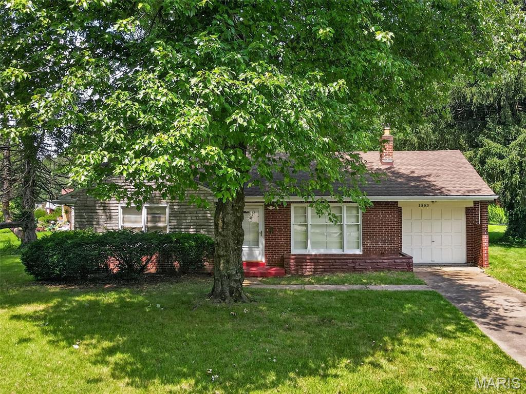 Welcome home to this well-maintained all-brick ranch situated on an oversized half-acre lot! This charming home features hardwood floors, a spacious living room, separate dining room, pantry, two comfortable bedrooms, and a full basement offering abundant storage and endless possibilities. The attached one car garage adds everyday convenience, while the patio and expansive backyard provide plenty of space to relax, entertain, or garden. Move-in ready with the potential to personalize and build equity, this home is ideal for first time homebuyers, downsizers, or investors.  Seller is providing a one-year HSA home warranty for added peace of mind. Don't miss your chance to make this wonderful home your own!