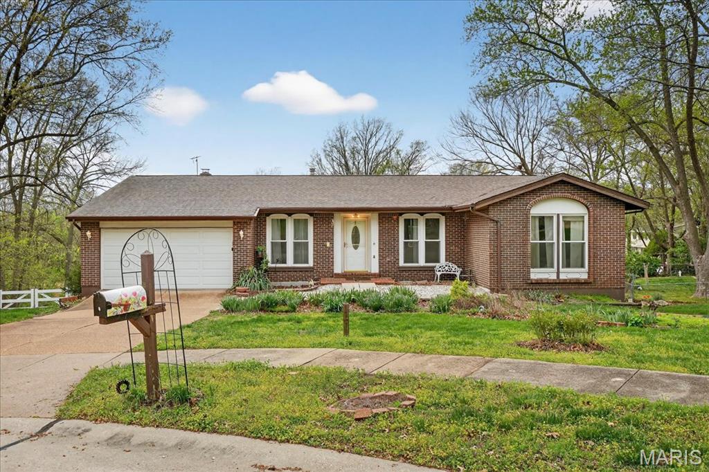 Welcome to this lovely 5-bedroom 3 bath ranch home in the heart of Parkway South. A center hall  has a living room and formal dining room flanking the foyer. This home has a beautifully updated eat-in kitchen that flows into the adjacent family room. The wood burning fireplace has been inspected and is a focal point surrounded by a rock wall. There is a lovely sun-drenched closed-in porch off the kitchen, offering a lovely retreat to enjoy your favorite plants. The primary suite is generous in size with an ensuite bath, sitting area and lots of natural light. Two more bedrooms with another full updated bath are on the main floor. The lower level has a large recreation room perfect for a pool or Ping-Pong table, with a snack bar, counter and sink area nearby. There are 2 more bedrooms and a full bath. This is a perfect home for a multi-generational family. The dry storage area is huge and includes a walk out to the backyard and the laundry area. All appliances can stay with the home, and are sold in "as is" condition. Located on a quiet cul-de-sac with easy access to highways, makes this a desirable address to call home!