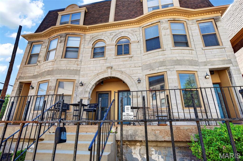 Nestled in the heart of St. Louis’ highly desirable Central West End, this beautiful two-bedroom, 1.5-bathroom condo perfectly blends classic city character with effortless modern living. From the street, the building welcomes you with an impressive stone archway and a charming brick patio courtyard. Inside, the main level features a bright, open-concept living and dining layout with large windows that flood the space with natural light. The crisp, fully equipped kitchen boasts classic white cabinetry, ample counter space, and a built-in dishwasher, making both everyday meal prep and hosting a breeze. Upstairs, the spacious bedrooms offer a peaceful retreat with neutral tones, generous closet space, and excellent light.

Living at 329 N. Boyle Avenue means enjoying an incredible lineup of community amenities, including a secluded courtyard swimming pool perfect for hot summer days and the ultimate peace of mind that comes with secured, gated parking. The location is truly unbeatable for anyone wanting a walkable urban lifestyle, situated just minutes from the city's finest dining, local coffee shops, Whole Foods, Forest Park, and the BJC Medical Complex. Whether you are looking for a vibrant new home or a low-maintenance property close to everything the Central West End has to offer, this condo is an absolute must-see. Schedule your private showing today to experience it for yourself! And if you want buy as an investment property, 1 year minimum lease is required.