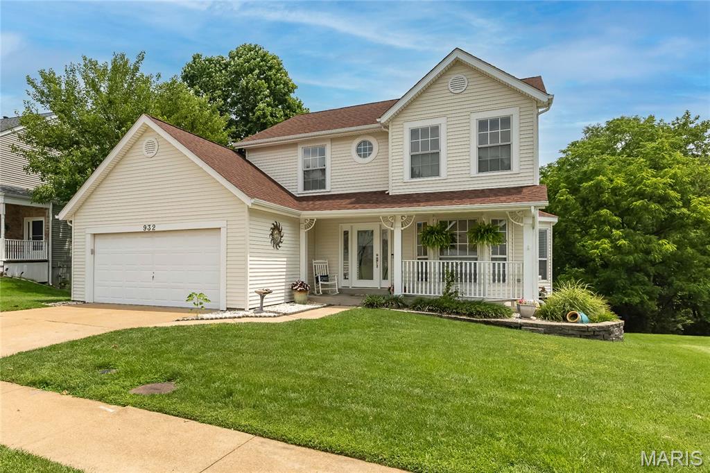 Welcome to a home that makes everyday life feel easier. With Sorrento Springs Elementary just a 6 minute bike ride away, this spacious 2-story with stunning new front door offers the kind of layout buyers love: an open main floor, a front living room, and a cozy back family room with fireplace and a full wall of windows overlooking mature trees and lush backyard greenery. No back door neighbors peeking at you while you lounge on your deck.  The updated kitchen features newer stainless appliances, striking art-worthy granite counters in 2026, and great flow thru the casual dining to the family room.  New LVT 2022  runs throughout the first floor, and top-down/bottom-up shades 2025 add privacy while still letting in beautiful natural light. The main-floor laundry room is a true bonus—not just a pass-through from the garage. Upstairs, the oversized primary suite offers room for a sitting area, reading corner, or nursery, plus a walk-in closet and private bath with double sinks, separate tub, and shower. The other 2 generous sized bedrooms share a full bath.  New carpeting 2026. The partially finished basement adds flexible space for a playroom, media area, or study nook. The large deck overlooks a peaceful, tree-lined yard.  HVAC 2020.  Kitchen appliances <5 yrs. Roof 2014. Walkable neighborhood, so convenient to services along Big Bend at 141 or on Manchester at Ries Road.  Castlewood State Park is just a stone's throw away with hiking, playgrounds, incredible views from the bluffs and even Kiefer Creek to splash in. Ballwin's rec center, The Pointe, offers indoor pool, fitness, basketball, track, playgrounds and more! A quick 5-minute drive from Cleta.  The outdoor pool is North Pointe Aquatic Center next to the Ballwin Golf Course and Clubhouse.