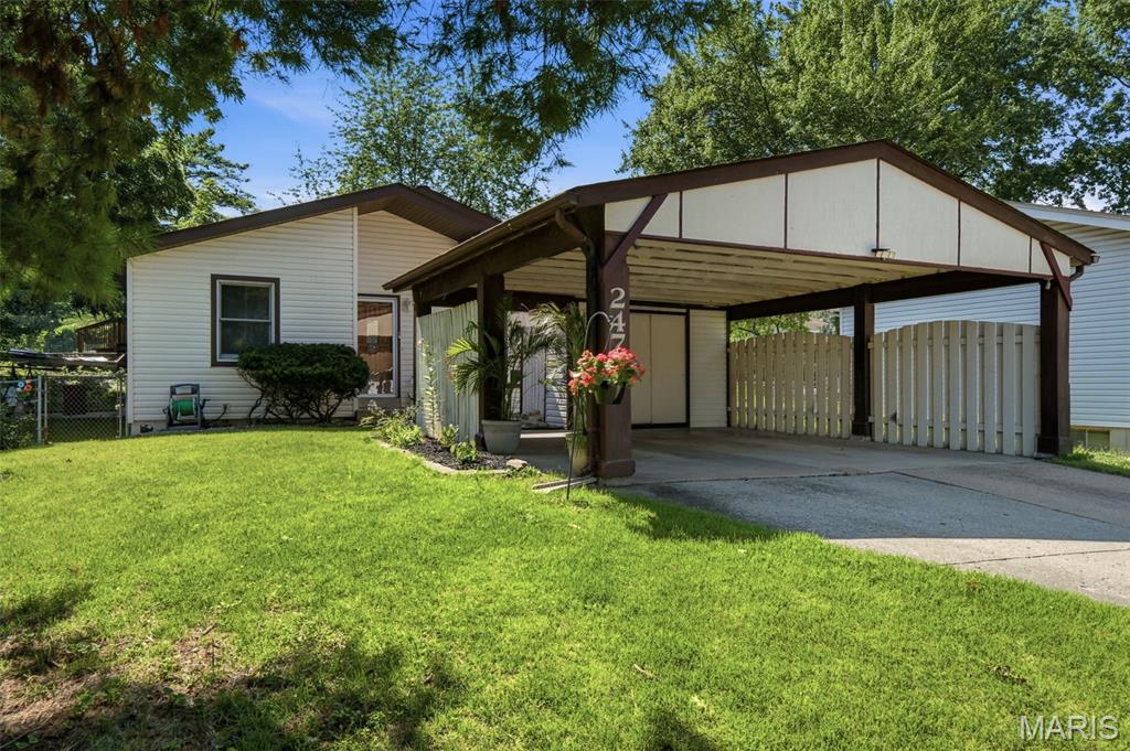 Move right in and start making memories at this adorable 3 bedroom, 2 bathroom Florissant home! Whether you're hosting game night in the recently finished lower level, enjoying a quiet evening in, or spending sunny afternoons at the nearby Florissant Aquatic Center, this home is ready to fit your lifestyle. The spacious two car carport provides plenty of covered parking, plus extra driveway space for guests. With comfortable living spaces, room to spread out, and a location close to parks, shopping, restaurants, and all the great amenities Florissant has to offer, this is one you'll want to see in person!