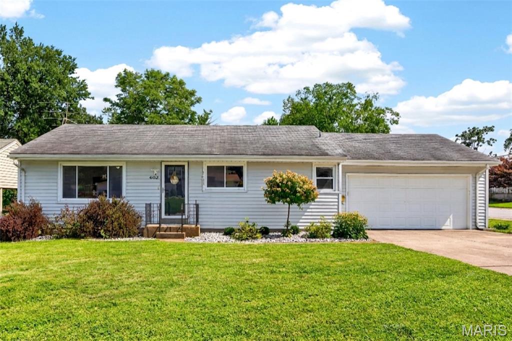 Fire up the grill on the screened porch, throw open the windows, and settle in. This updated, open-concept ranch was built for good weekends and easy hosting.
Step through the front door into a wide-open main level where the living room, dining area, and kitchen share one bright, connected space. A big picture window pulls natural light across the whole floor, and there is room to spread out whether you are hosting a crowd or having a quiet night in. The kitchen anchors it all with white shaker cabinets, granite counters, a granite breakfast bar, and stainless steel appliances. The refrigerator stays with the home.
Down the hall are three bedrooms, enough for guests, a roommate, or a home office that looks out over the backyard. The full bath is updated with a granite vanity and vessel sink. Neutral paint and ceiling fans run throughout.
The lower level is spacious and clean. It is partially finished, already has a bathroom, and offers plenty of room for a game room, home gym, or hangout space, plus dedicated storage.
Out back is a screened porch and fenced corner-lot yard. The oversized two-car garage and long driveway handle parking with room to spare. Neighborhood shops and school are within walking distance, Historic Main Street St. Charles is minutes away for dinner, drinks, and breweries, and I-70 and Highway 364 are a quick hop from there.
Yes, the floors have seen better days, and we are not going to pretend otherwise. That is exactly why the seller is offering a $3,500 flooring credit, so you can put down whatever you actually want.
Recent updates include: ROOF (2021), HVAC SYSTEM (2021), updated kitchen, updated bathroom, and a new front door.
Come see it, then make it yours. Schedule your showing today.