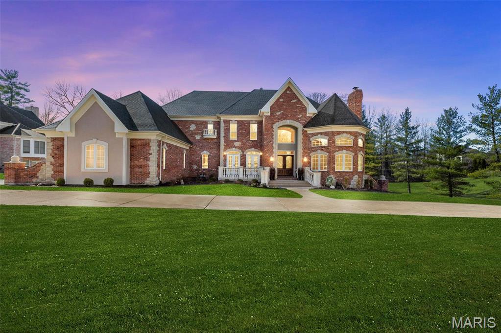Elegant estate situated on one acre! From a grand 2-story entrance you'll notice supreme finishes like ornate moulding/trim, fresh paint, new 3/4'' White Oak Engineered hdwd floors, & built-in shelving. Head past the massive study & formal dining rm into the great rm w/ floor-to-ceiling windows, wet bar & one of the FIVE fireplaces. The vaulted kitchen is adorned w/ a butler's pantry and dual islands, New Thermador Appliances, mudroom w/cubbies and laundry rm, one of two half baths on the main flr, breakfast rm, hearth rm & French doors that lead to massive new composite deck. The main floor primary suite has a luxury bath & 2 walk-ins. Upstairs you'll find a loft, 2 bdrms and jack-n-jill bath. The W/O LL is a pleaser w new stain master carpet/ a fmly rm, kitchen/bar, gas fireplace, craft rm, Bedroom, Full Bath, Mother in Laws Suite complete with Kitchen, L/Room, and Full Bath & w/ tons of storage. All new Lighting. Freshly Painted. New Trim and Baseboards. New Roof. New Landscaping. Additional Rooms: Mud Room
