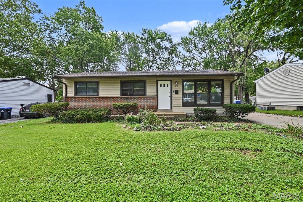 Move-in ready four-bedroom, 1.5-bathroom home in the desirable De Smet neighborhood of Florissant, Missouri. This home features an open floor plan that flows beautifully through a mix of tile, carpet, and vinyl/laminate flooring. The kitchen is stylishly equipped with quartz countertops and black appliances, making it a functional space for everyday living and entertaining. The primary bedroom serves as a comfortable retreat, complete with a large walk-in closet and its own primary bathroom.
Additional living space awaits in the finished, partially finished basement, offering great versatility for your lifestyle needs. Step outside to a fully fenced backyard, providing a secure and private outdoor area.
Ideally located with no HOA fees, this property is just five minutes from everyday essentials and local schools, while offering an easy commute to major employers and St. Louis Lambert International Airport.
Schedule your private showing today!
