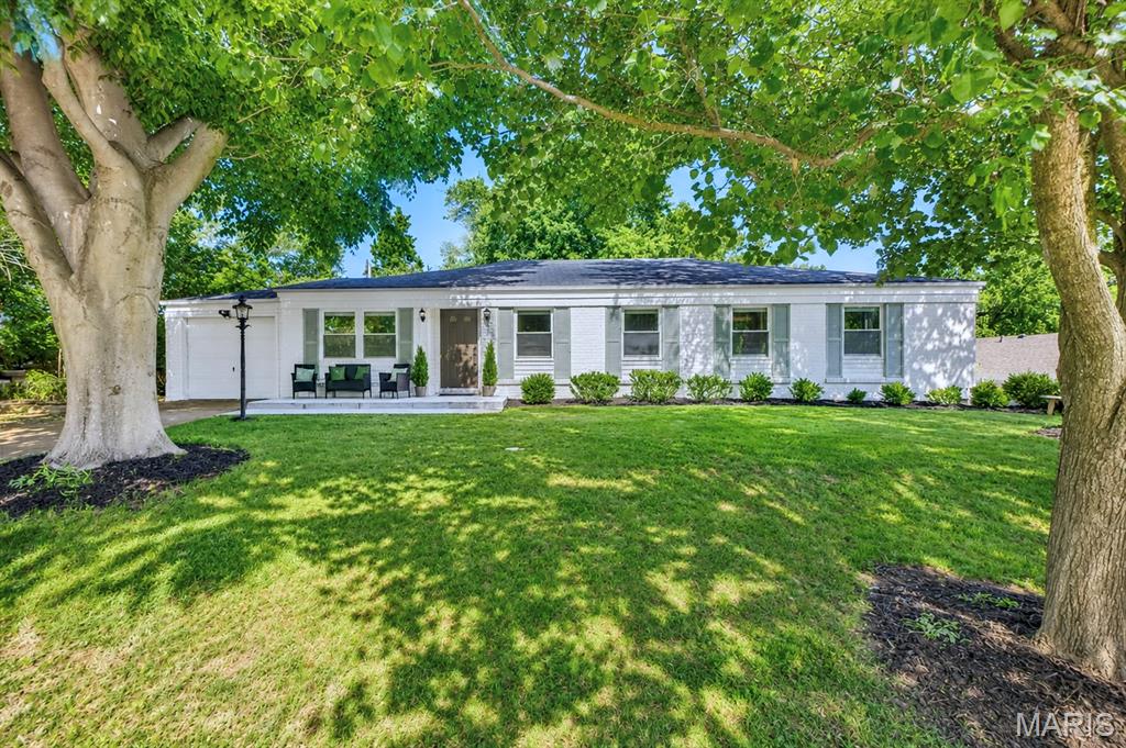 Tucked into a quiet, tree-lined neighborhood in the Parkway School District, this Ranch offers the layout buyers are always hoping to find. Refinished hardwood floors (2026) run throughout the main living spaces, with an easy, connected flow that still keeps that classic ranch feel. The Kitchen opens to the Living and Dining areas, making everything from busy mornings to hosting friends feel effortless.
The Primary Suite features a refreshed Full Bath, while three additional Bedrooms share a remodeled hall bath—giving everyone space while keeping life on one level. The walkout lower level adds a large Rec Room, full bath, and flexible bonus spaces with new flooring—perfect for a playroom, home office, or guest setup.
Out back, enjoy a private, tree-lined yard with room to relax, play, or unwind after the day. You’re just minutes from shopping, dining, and a neighborhood pond with a fountain that’s perfect for evening walks.
Major updates include HVAC (2024), radon system and sump pump (2023), plus updated lighting throughout. Come see your new home today!